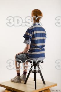 Sitting reference of whole body striped blue gray shirt blue…